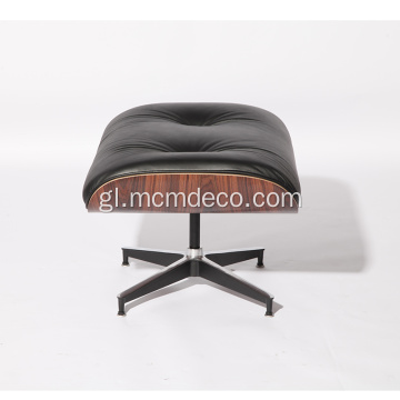 Sillón clásico Eames de coiro Aniline e otomán